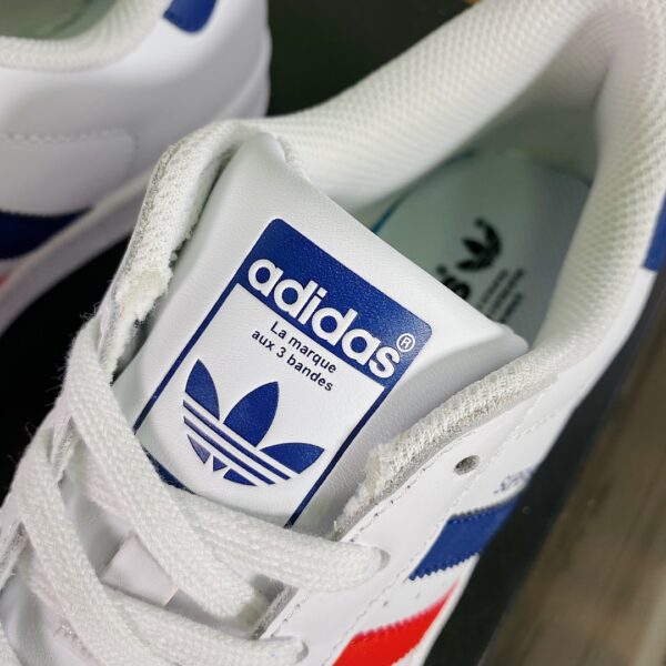 Giày Adidas Superstar trắng vạch xanh đỏ