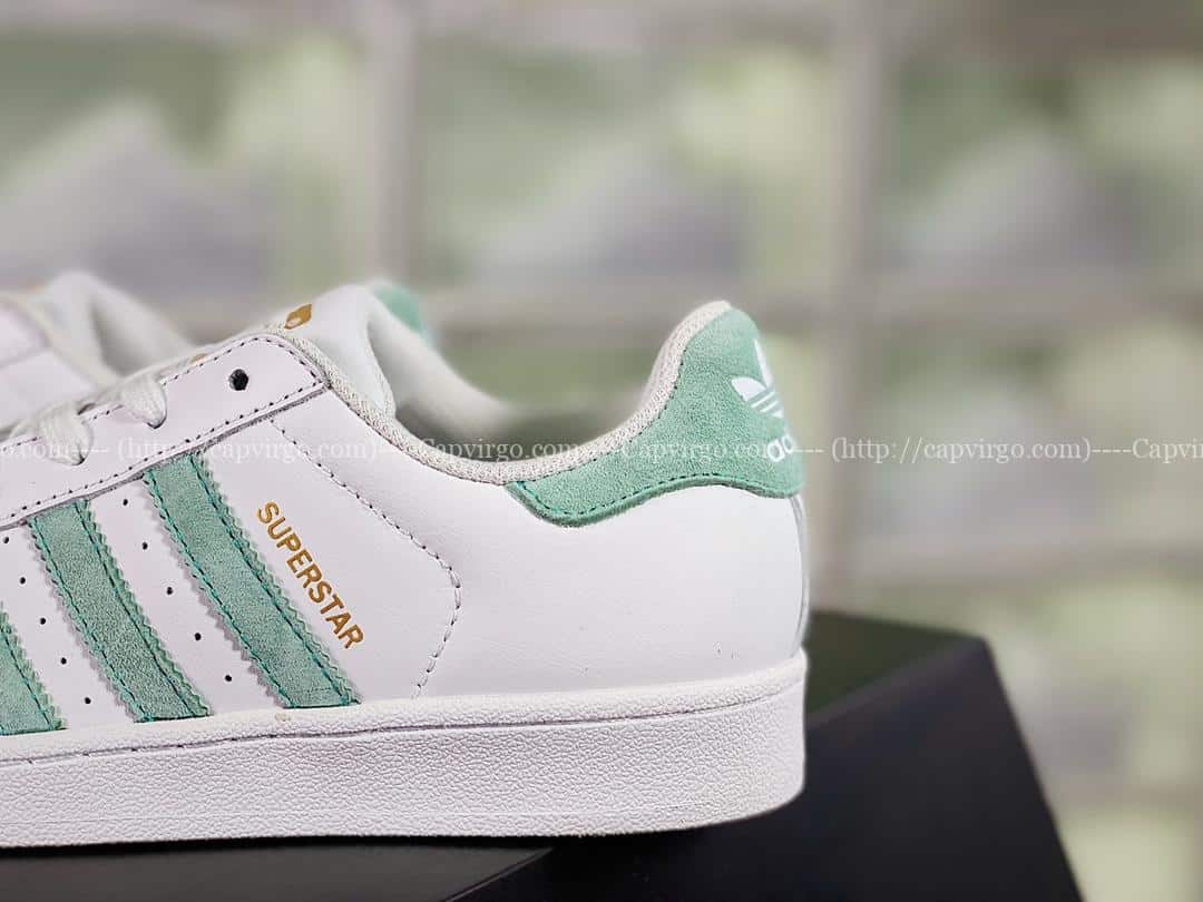 Giày Adidas Superstar màu trắng sọc xanh ngọc