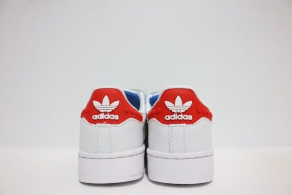 Giày Adidas Superstar trẻ em màu trắng vàng đỏ