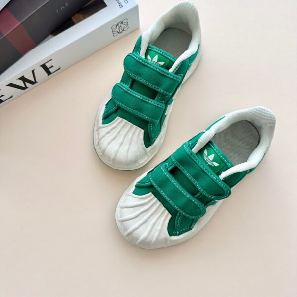 Giày Adidas trẻ em Shell Toe Canvas màu xanh vạch trắng